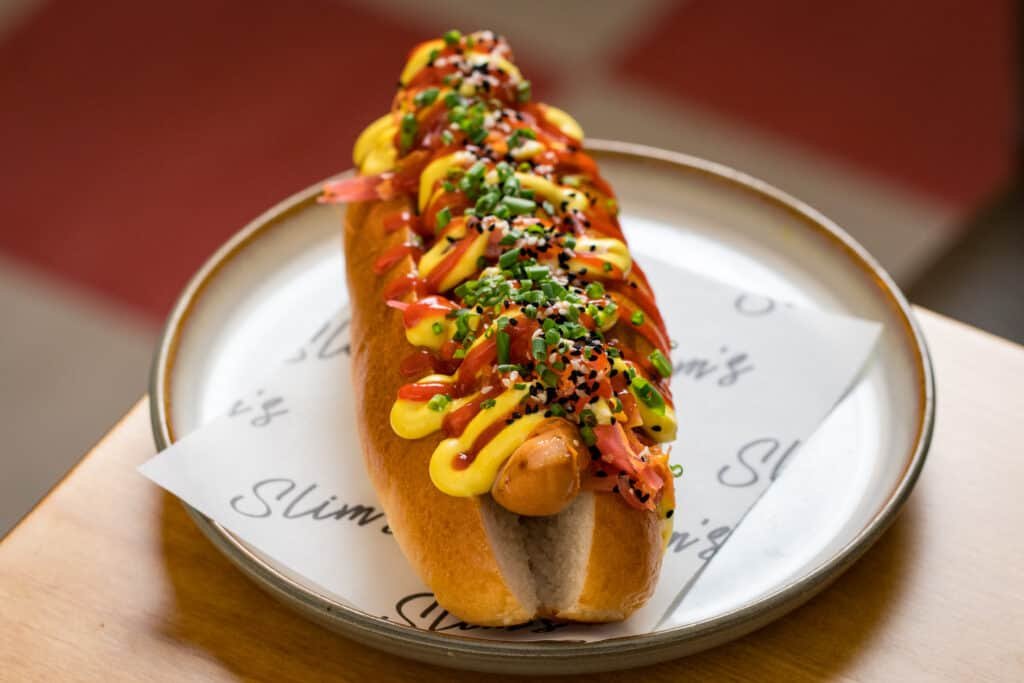 Celebrate National Hot Dog Day at Slim's with 100 free hot dogs giveaway!